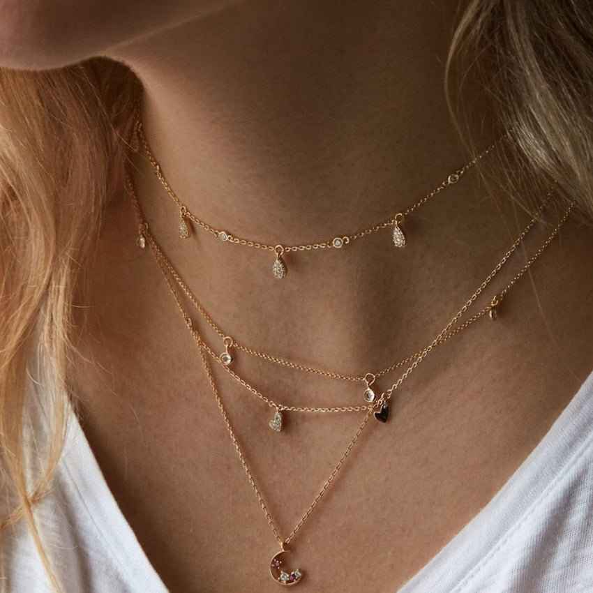 10 Accessoires Indispensables pour Compléter votre Style Parisien avec le Collier Lune et Étoile - parlezmode.com